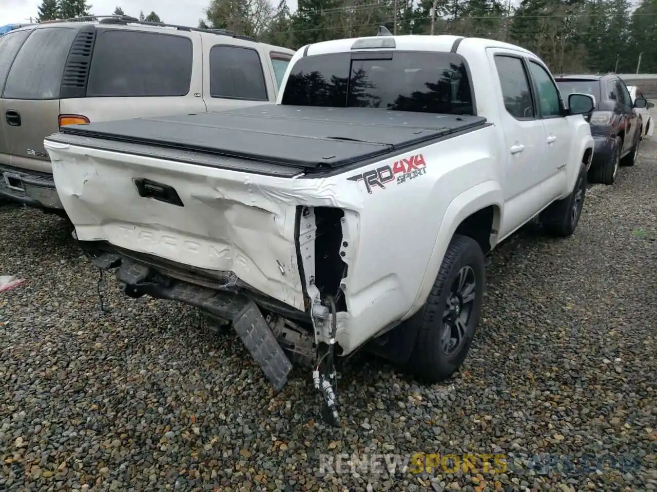 4 Photograph of a damaged car 3TMCZ5AN5KM232619 TOYOTA TACOMA 2019