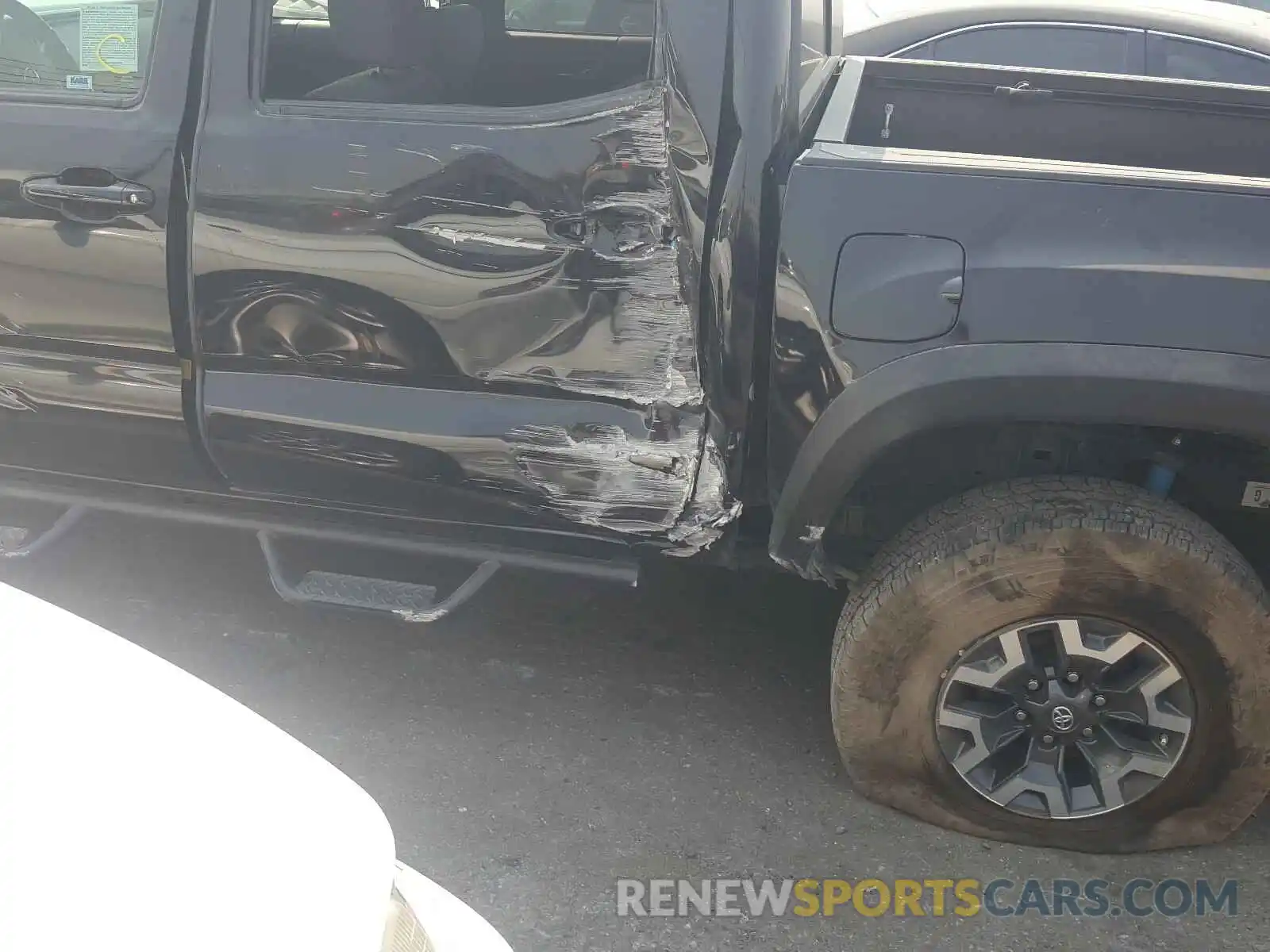 9 Photograph of a damaged car 3TMCZ5AN5KM236525 TOYOTA TACOMA 2019