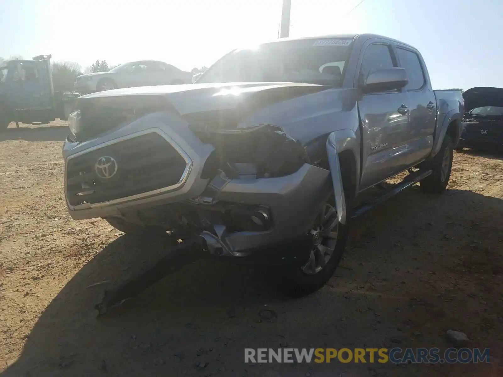 2 Photograph of a damaged car 3TMCZ5AN5KM238081 TOYOTA TACOMA 2019