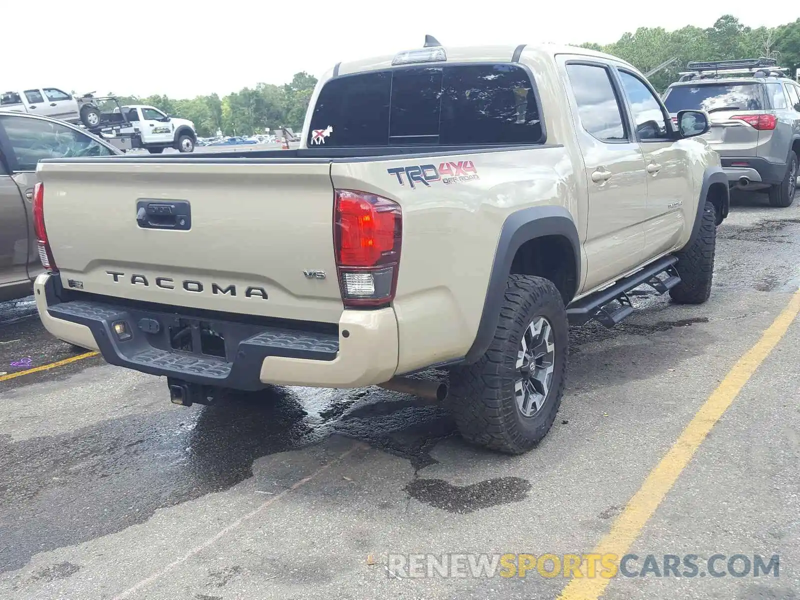 4 Photograph of a damaged car 3TMCZ5AN5KM243443 TOYOTA TACOMA 2019