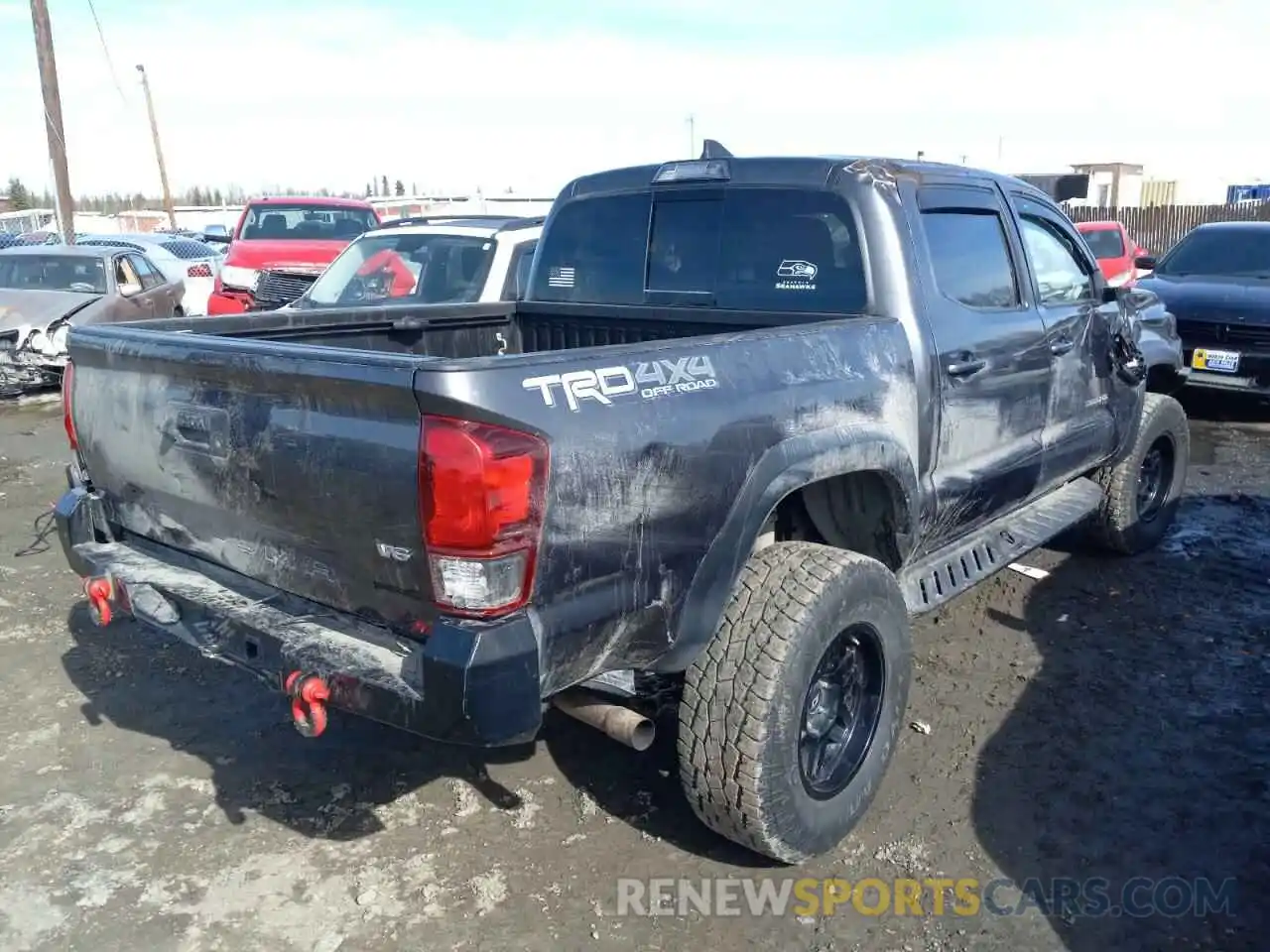 4 Photograph of a damaged car 3TMCZ5AN5KM246603 TOYOTA TACOMA 2019