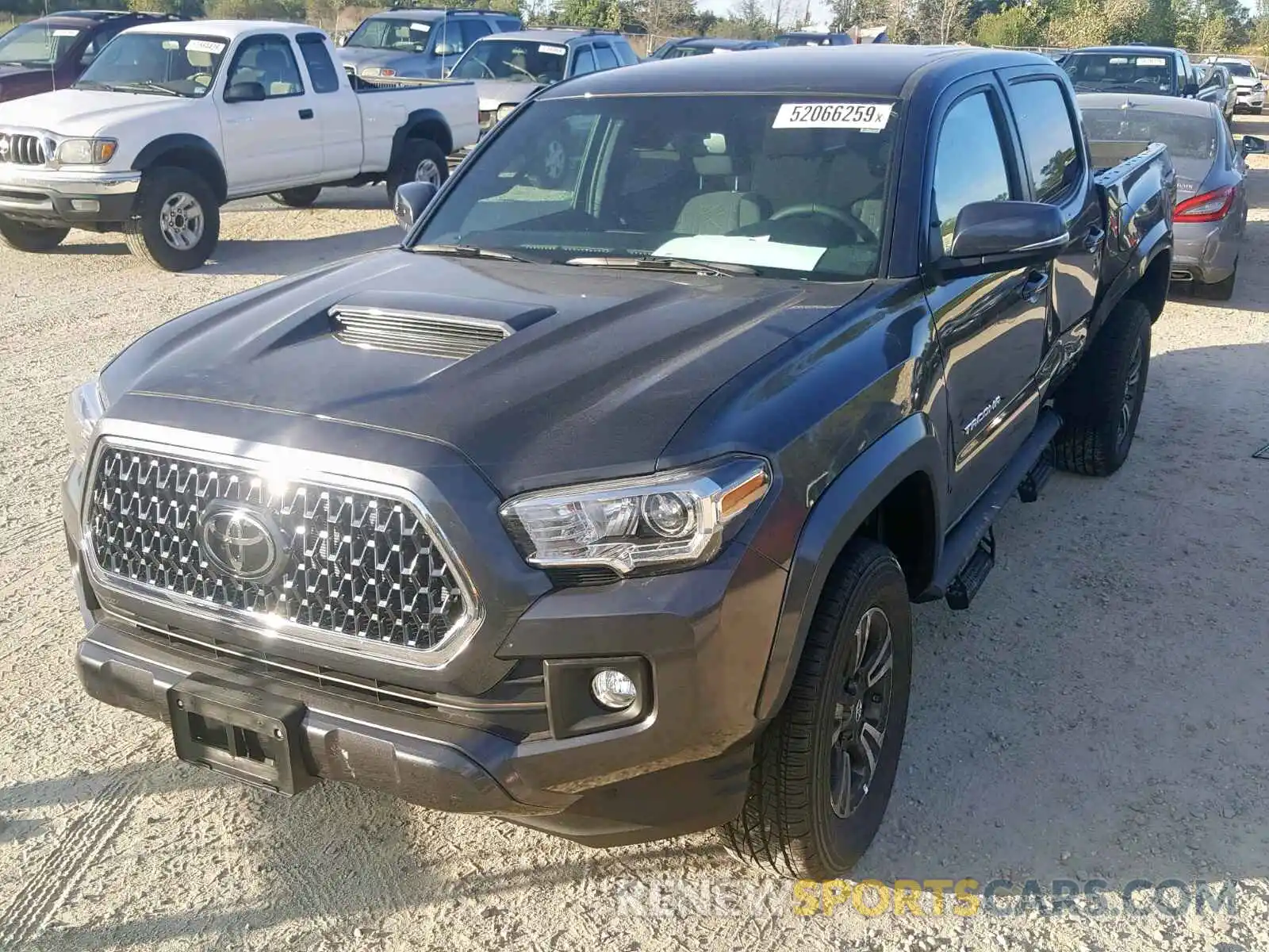 2 Photograph of a damaged car 3TMCZ5AN5KM252319 TOYOTA TACOMA 2019