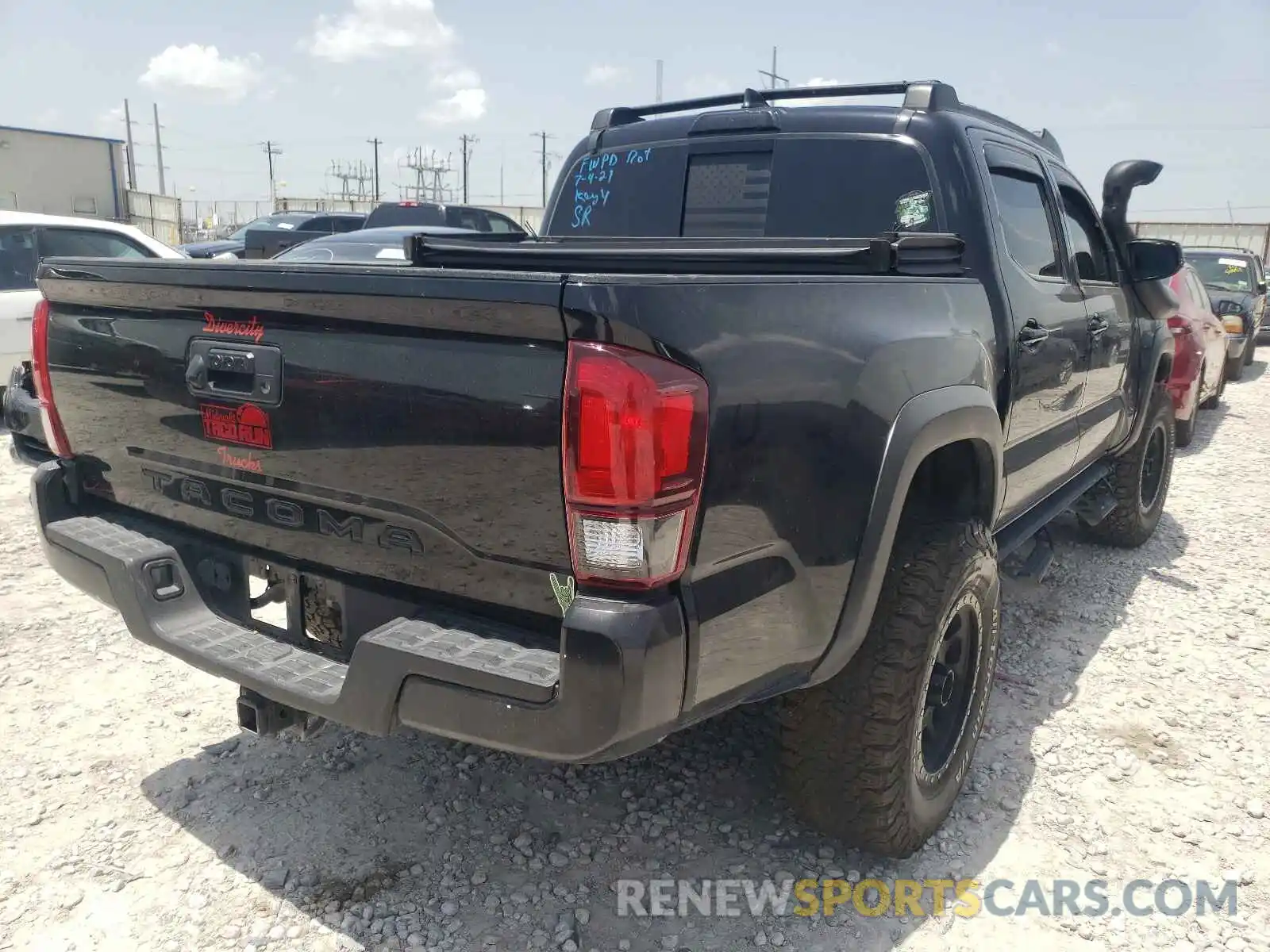 4 Photograph of a damaged car 3TMCZ5AN5KM261179 TOYOTA TACOMA 2019