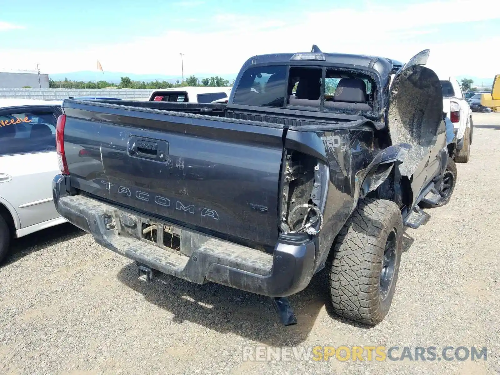 4 Photograph of a damaged car 3TMCZ5AN5KM266642 TOYOTA TACOMA 2019