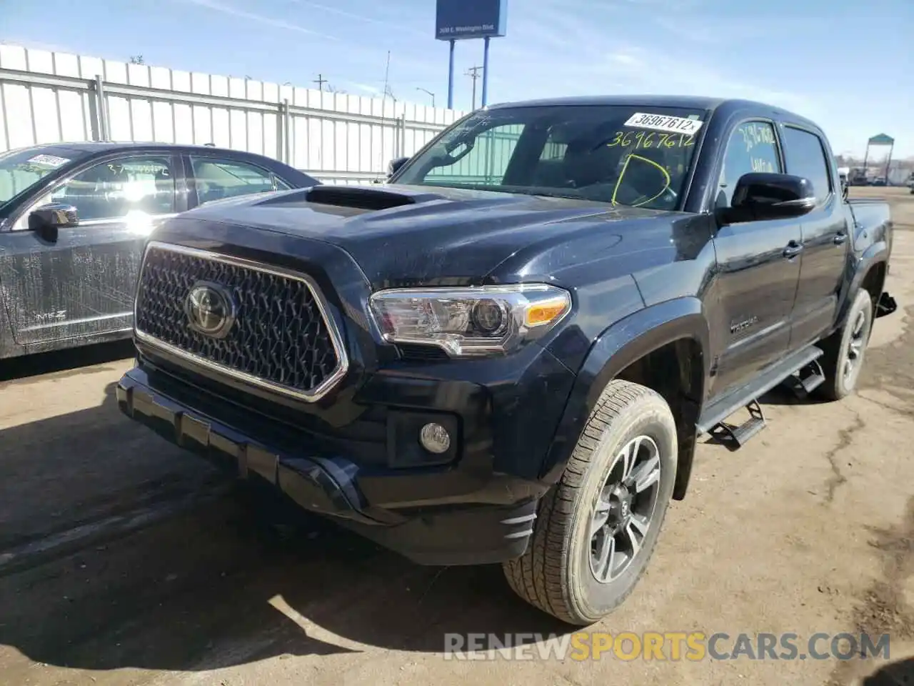 2 Photograph of a damaged car 3TMCZ5AN5KM269699 TOYOTA TACOMA 2019