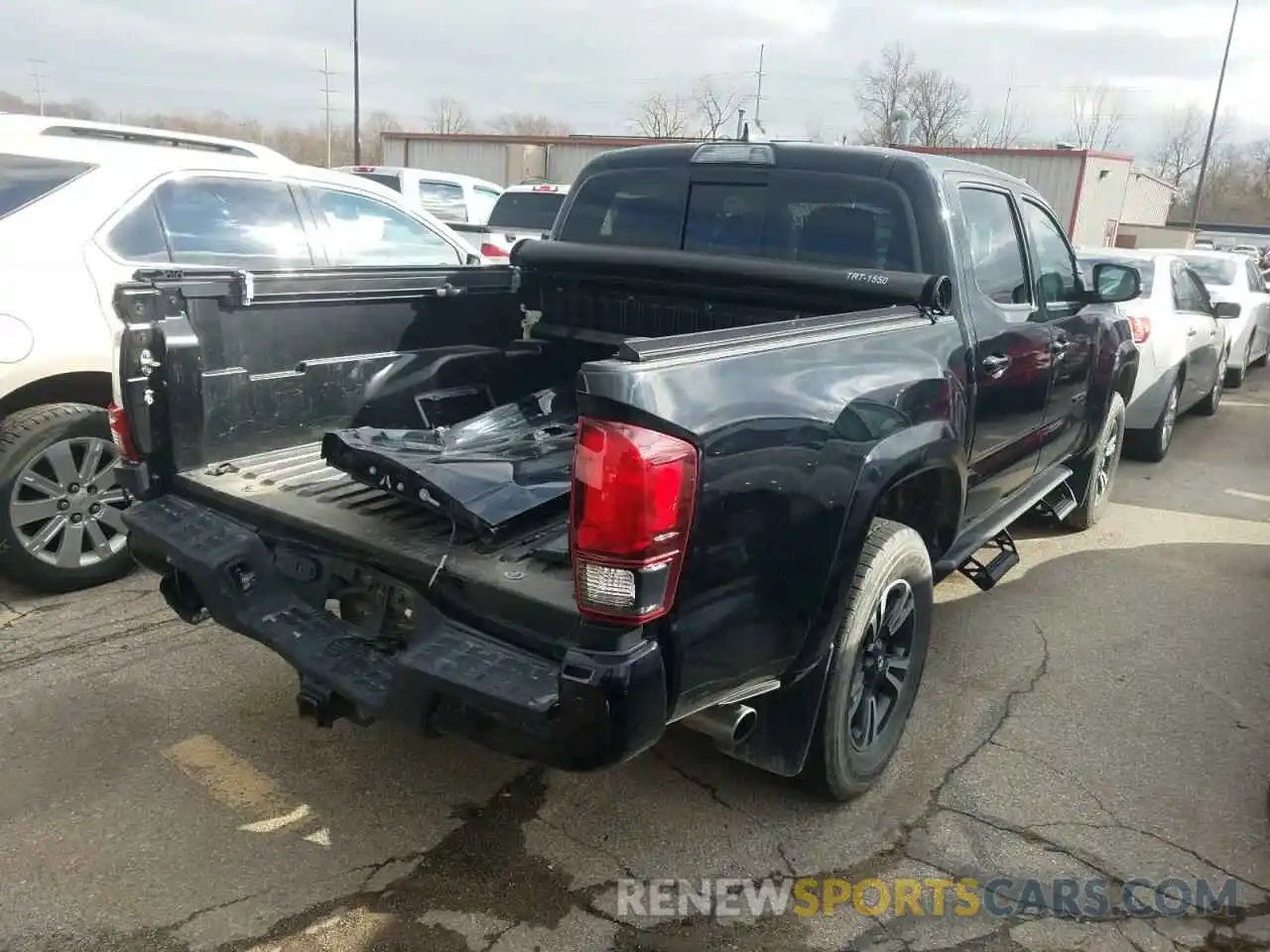 4 Photograph of a damaged car 3TMCZ5AN5KM269699 TOYOTA TACOMA 2019