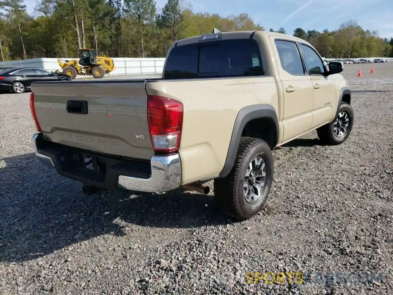 4 Photograph of a damaged car 3TMCZ5AN5KM270528 TOYOTA TACOMA 2019