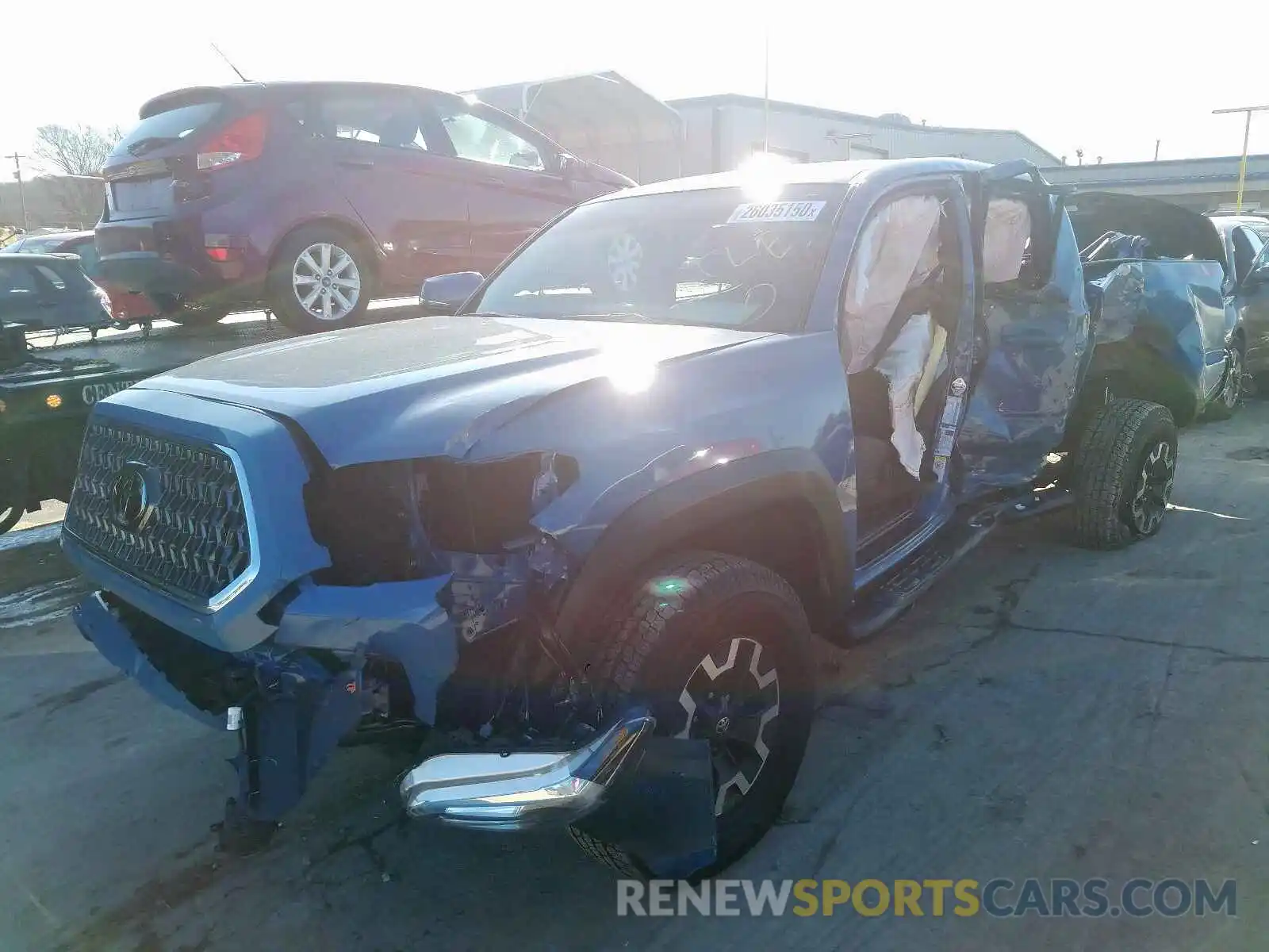 2 Photograph of a damaged car 3TMCZ5AN5KM270884 TOYOTA TACOMA 2019