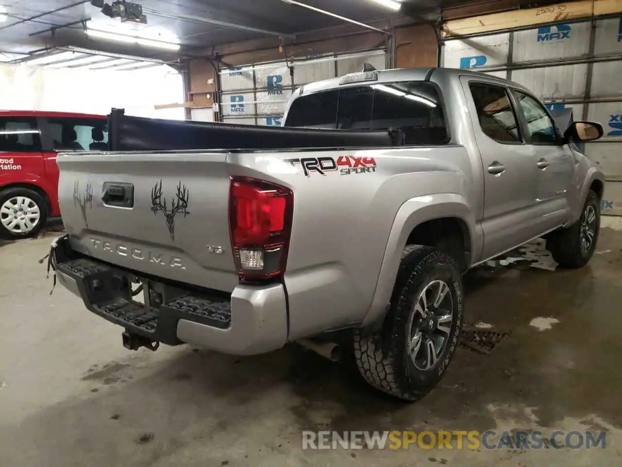 4 Photograph of a damaged car 3TMCZ5AN5KM272313 TOYOTA TACOMA 2019