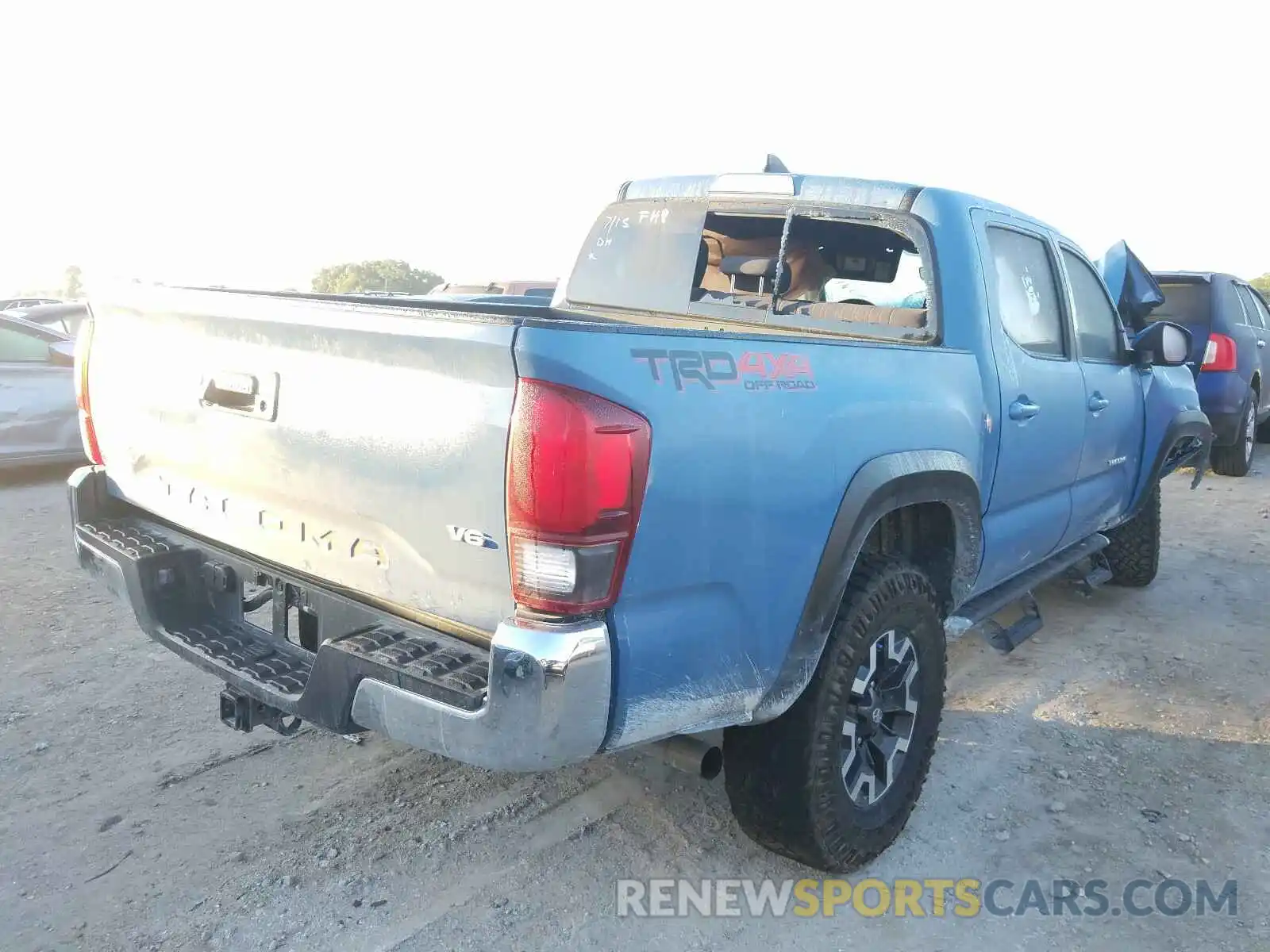 4 Photograph of a damaged car 3TMCZ5AN5KM280797 TOYOTA TACOMA 2019