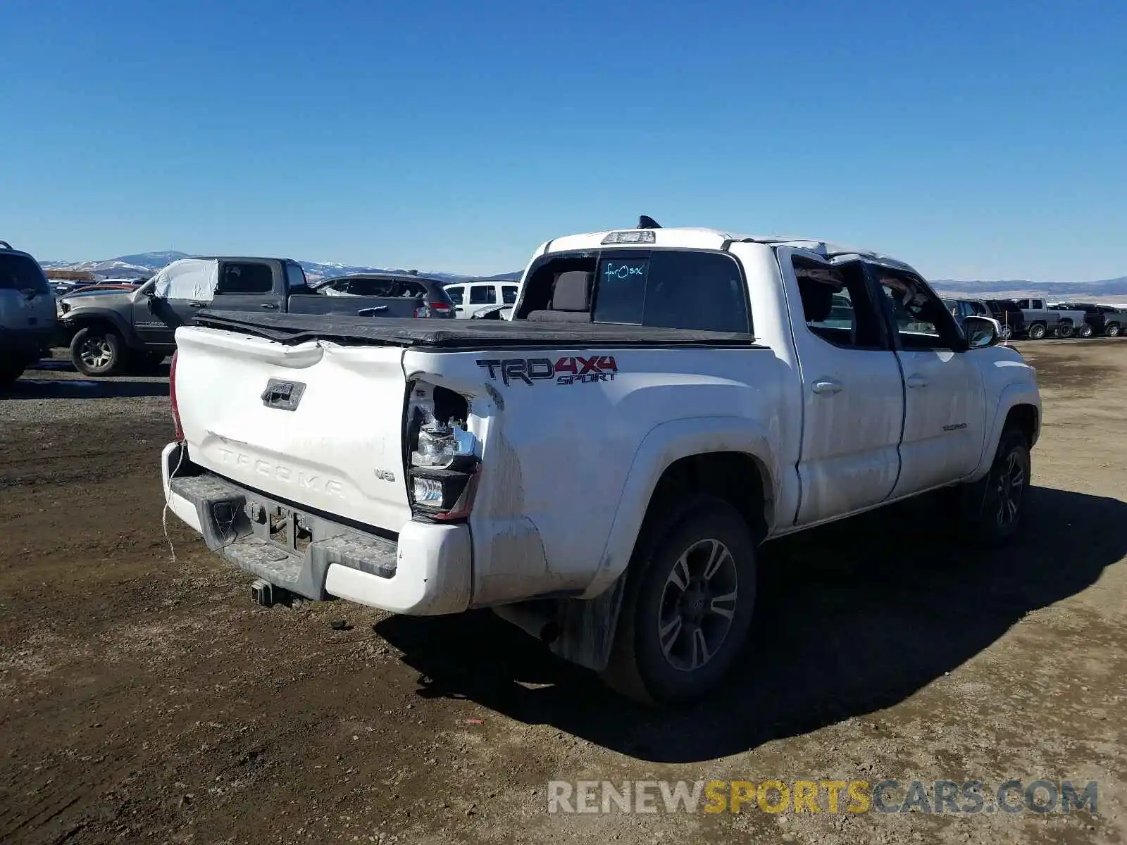 4 Photograph of a damaged car 3TMCZ5AN5KM282341 TOYOTA TACOMA 2019