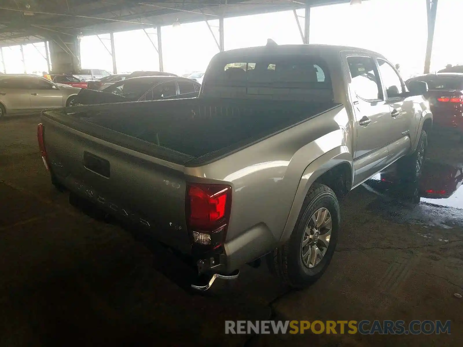 4 Photograph of a damaged car 3TMCZ5AN5KM283716 TOYOTA TACOMA 2019