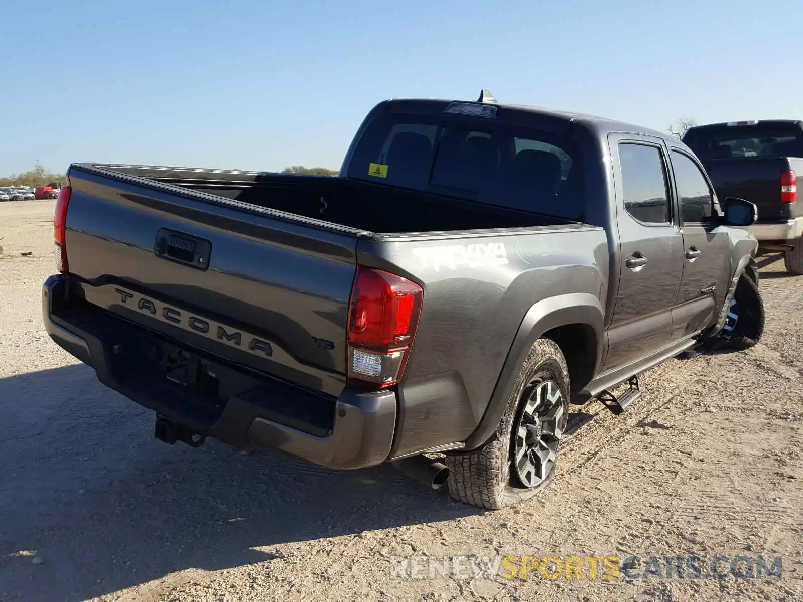 4 Photograph of a damaged car 3TMCZ5AN5KM285420 TOYOTA TACOMA 2019