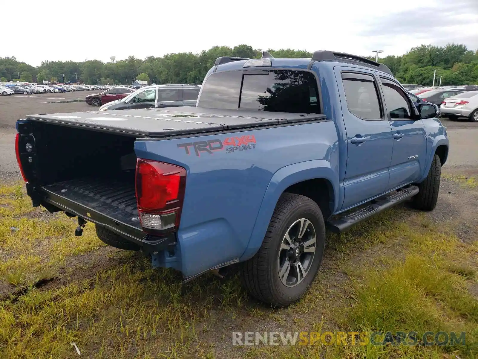 4 Photograph of a damaged car 3TMCZ5AN6KM193958 TOYOTA TACOMA 2019