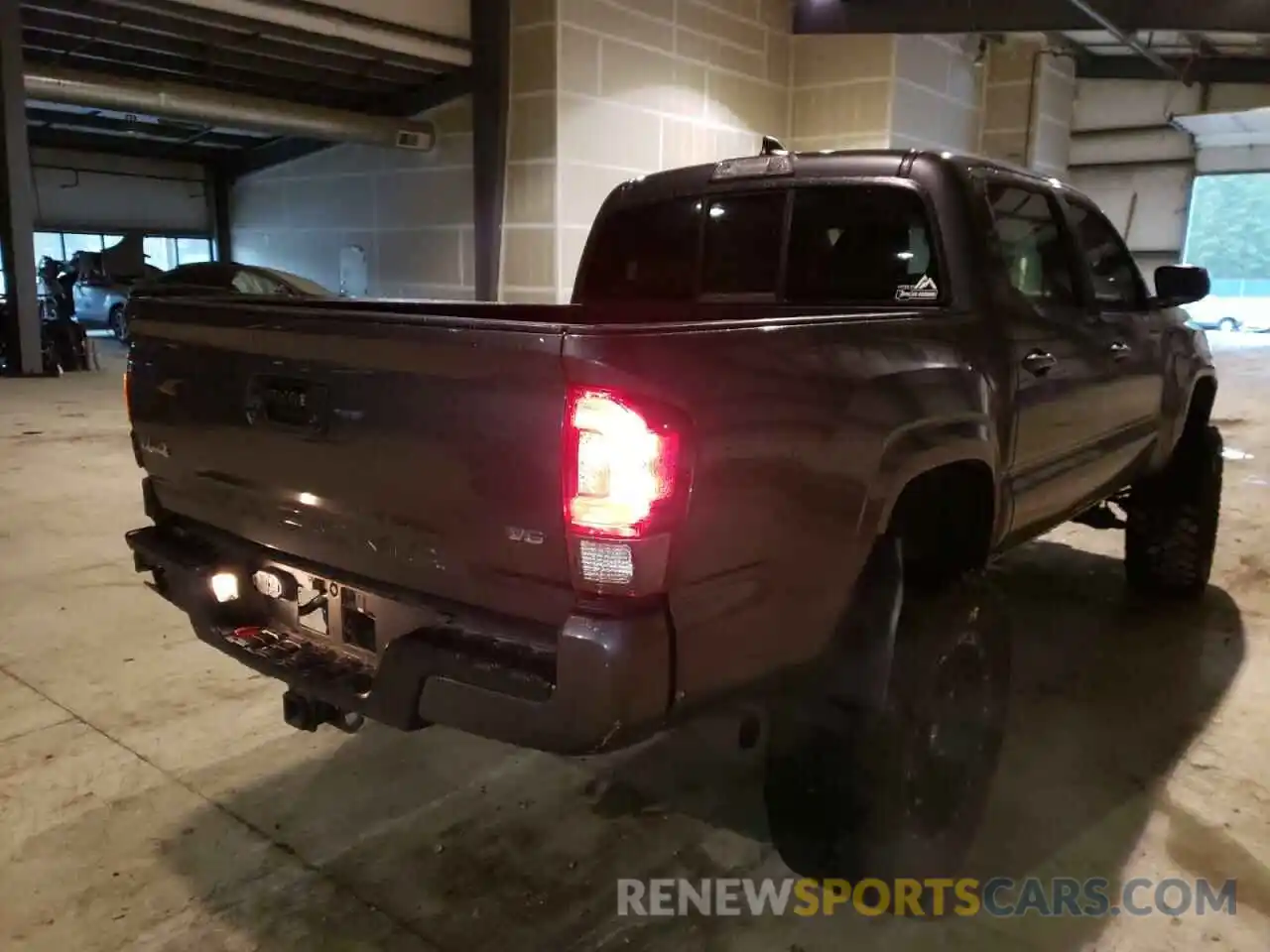 4 Photograph of a damaged car 3TMCZ5AN6KM196794 TOYOTA TACOMA 2019