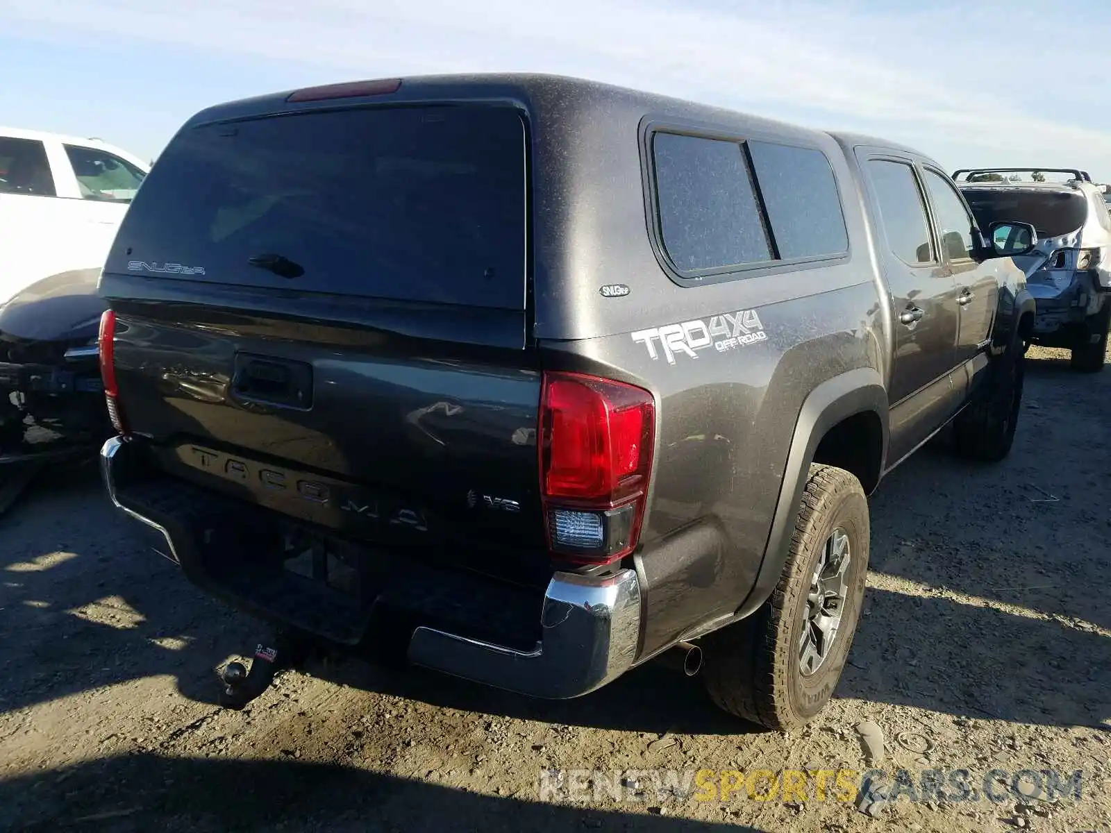 4 Photograph of a damaged car 3TMCZ5AN6KM198738 TOYOTA TACOMA 2019