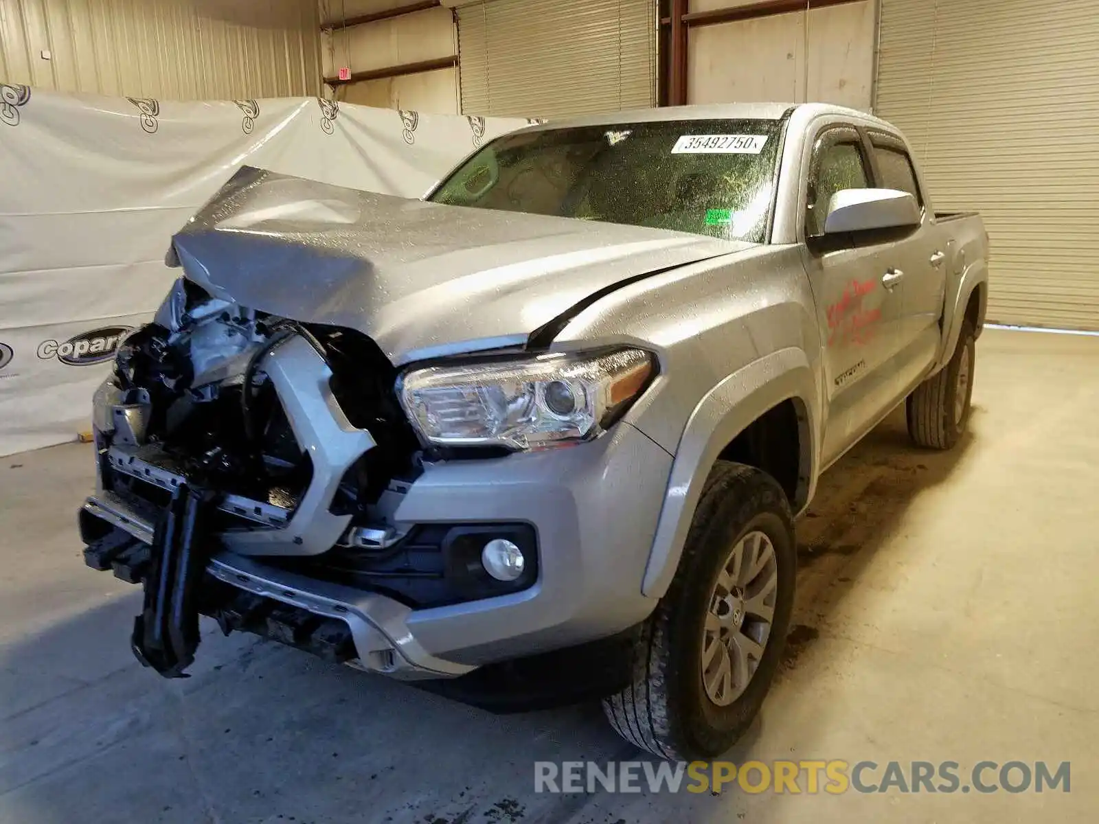 2 Photograph of a damaged car 3TMCZ5AN6KM200570 TOYOTA TACOMA 2019