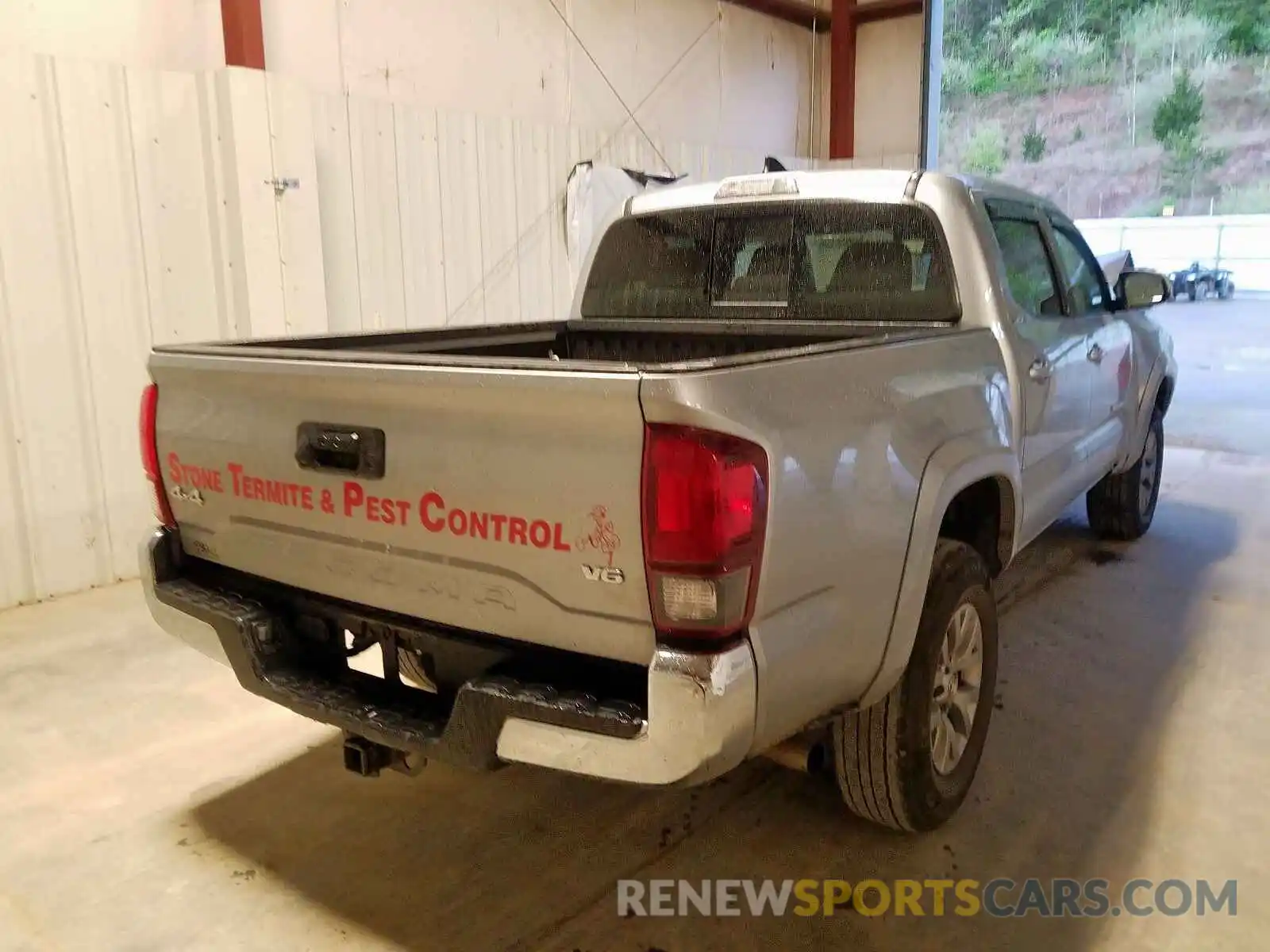 4 Photograph of a damaged car 3TMCZ5AN6KM200570 TOYOTA TACOMA 2019