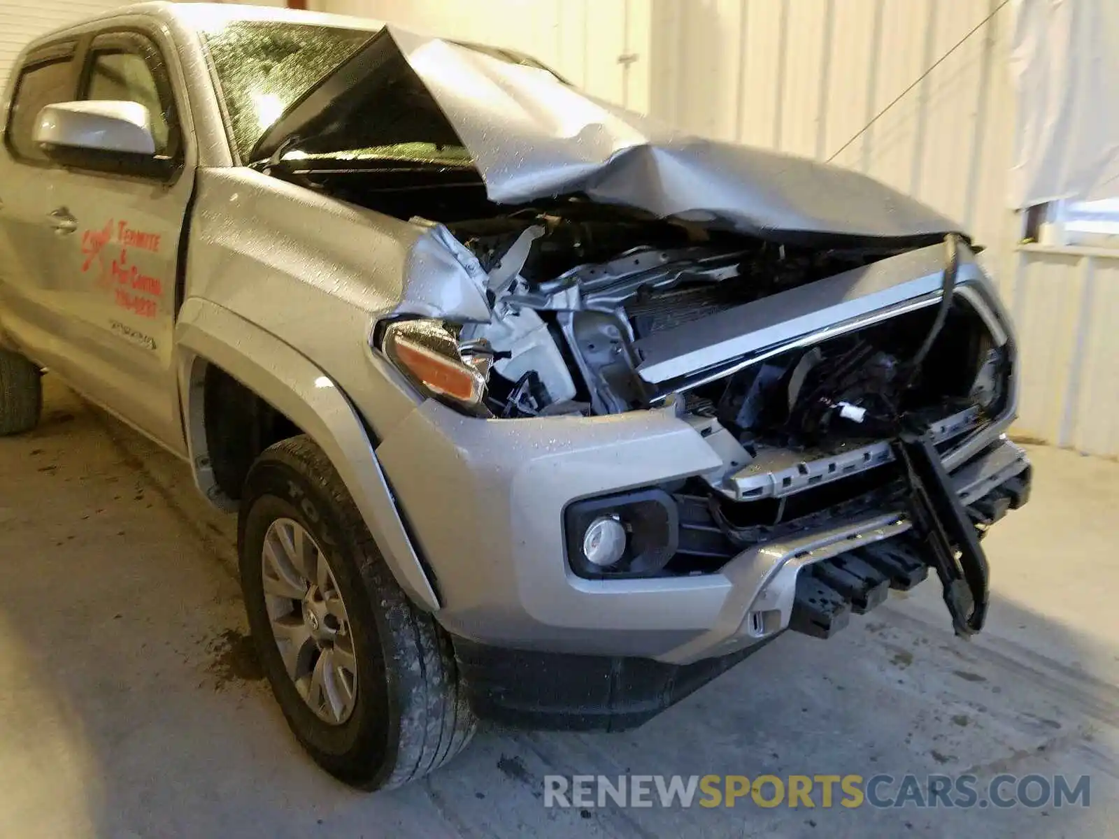 9 Photograph of a damaged car 3TMCZ5AN6KM200570 TOYOTA TACOMA 2019