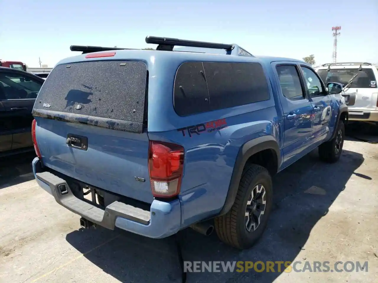 4 Photograph of a damaged car 3TMCZ5AN6KM205767 TOYOTA TACOMA 2019