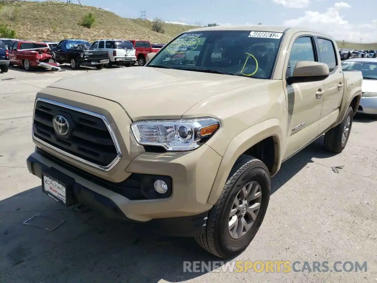 2 Photograph of a damaged car 3TMCZ5AN6KM206210 TOYOTA TACOMA 2019