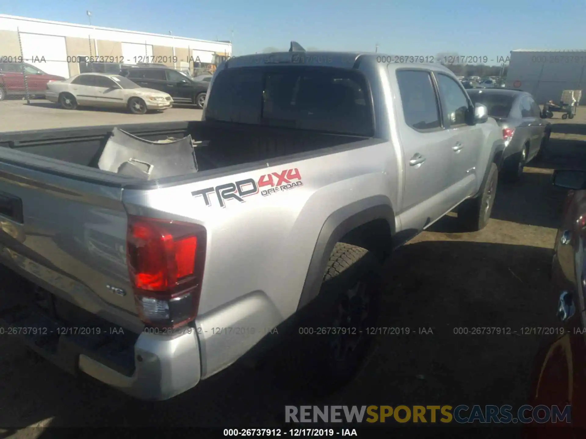 4 Photograph of a damaged car 3TMCZ5AN6KM207762 TOYOTA TACOMA 2019