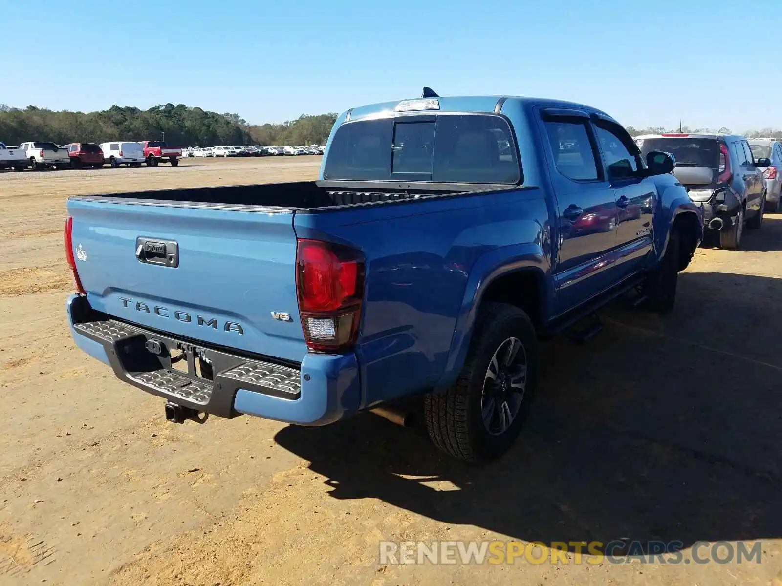 4 Photograph of a damaged car 3TMCZ5AN6KM211777 TOYOTA TACOMA 2019