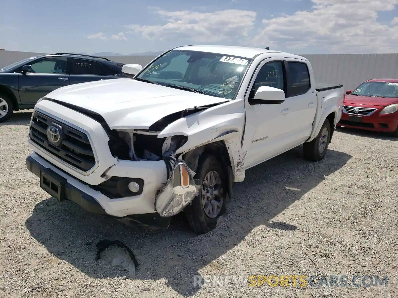 2 Photograph of a damaged car 3TMCZ5AN6KM213187 TOYOTA TACOMA 2019