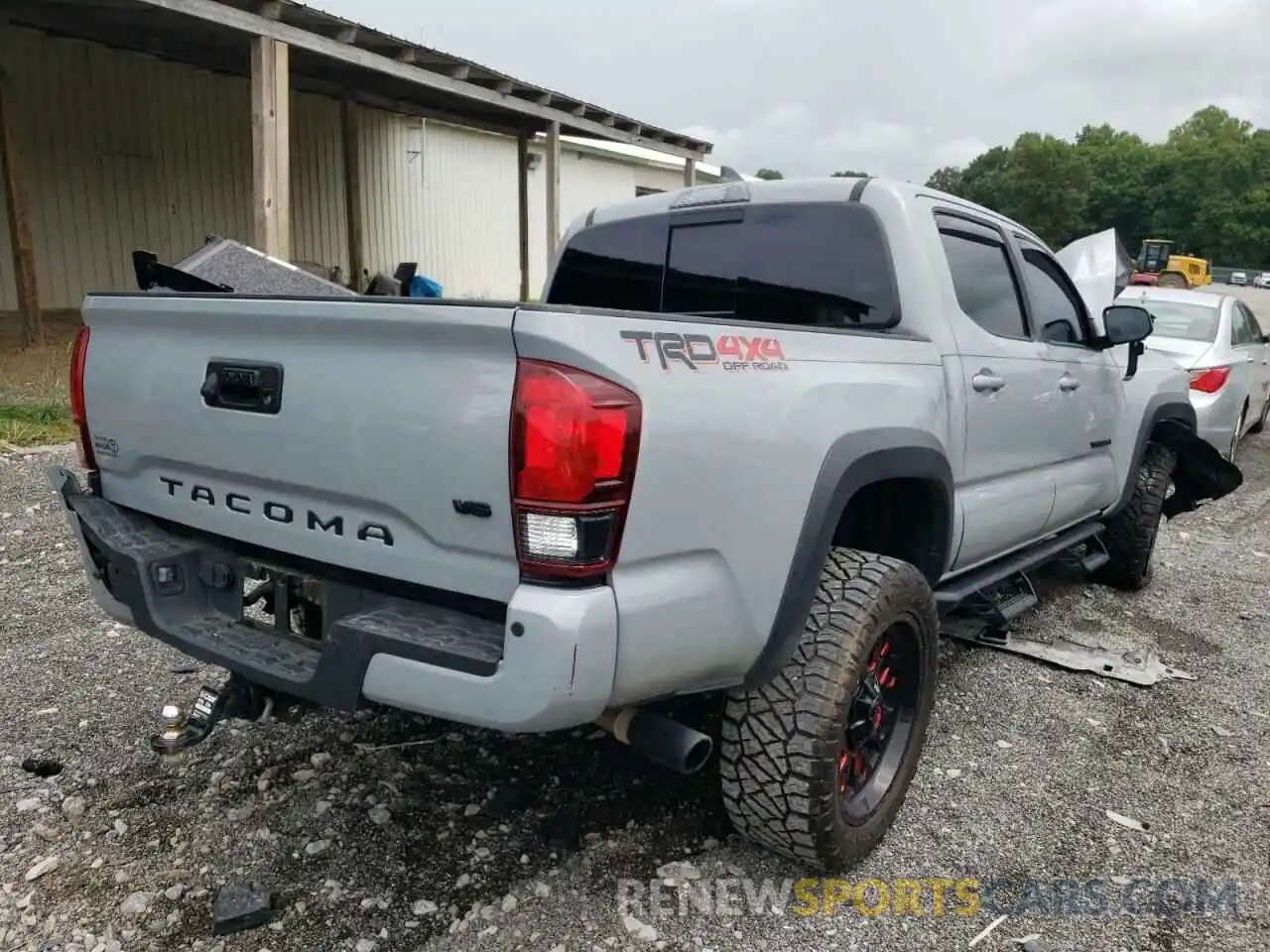 4 Photograph of a damaged car 3TMCZ5AN6KM213982 TOYOTA TACOMA 2019