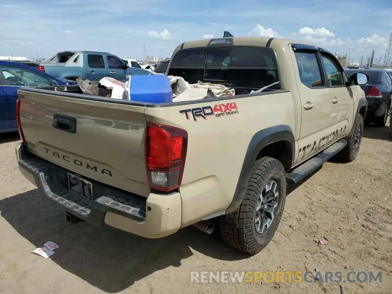 4 Photograph of a damaged car 3TMCZ5AN6KM221760 TOYOTA TACOMA 2019