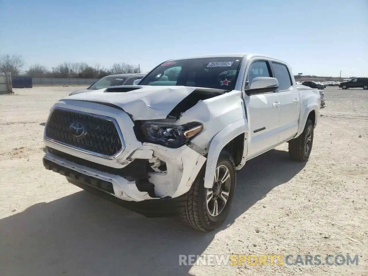 2 Photograph of a damaged car 3TMCZ5AN6KM223010 TOYOTA TACOMA 2019