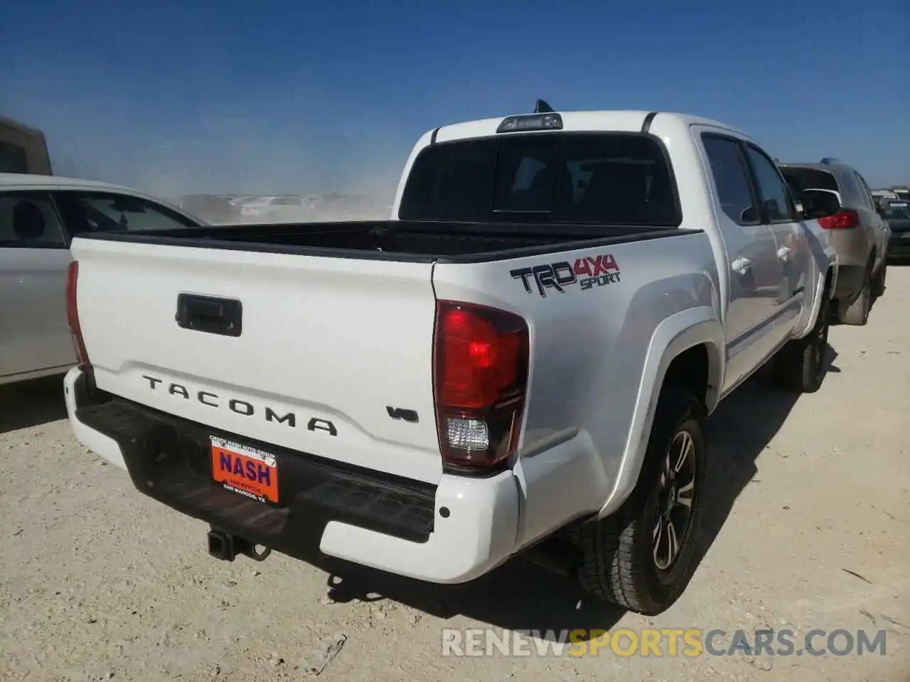 4 Photograph of a damaged car 3TMCZ5AN6KM223010 TOYOTA TACOMA 2019