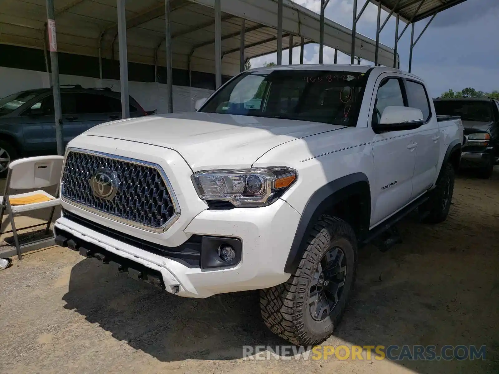 2 Photograph of a damaged car 3TMCZ5AN6KM224433 TOYOTA TACOMA 2019