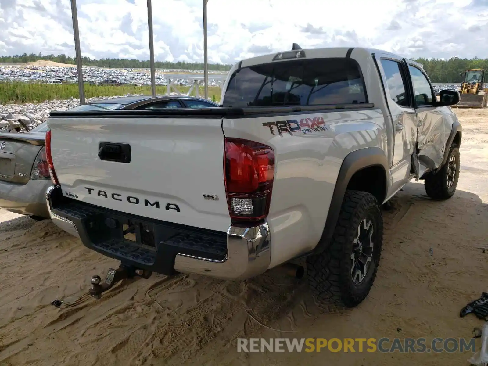 4 Photograph of a damaged car 3TMCZ5AN6KM224433 TOYOTA TACOMA 2019