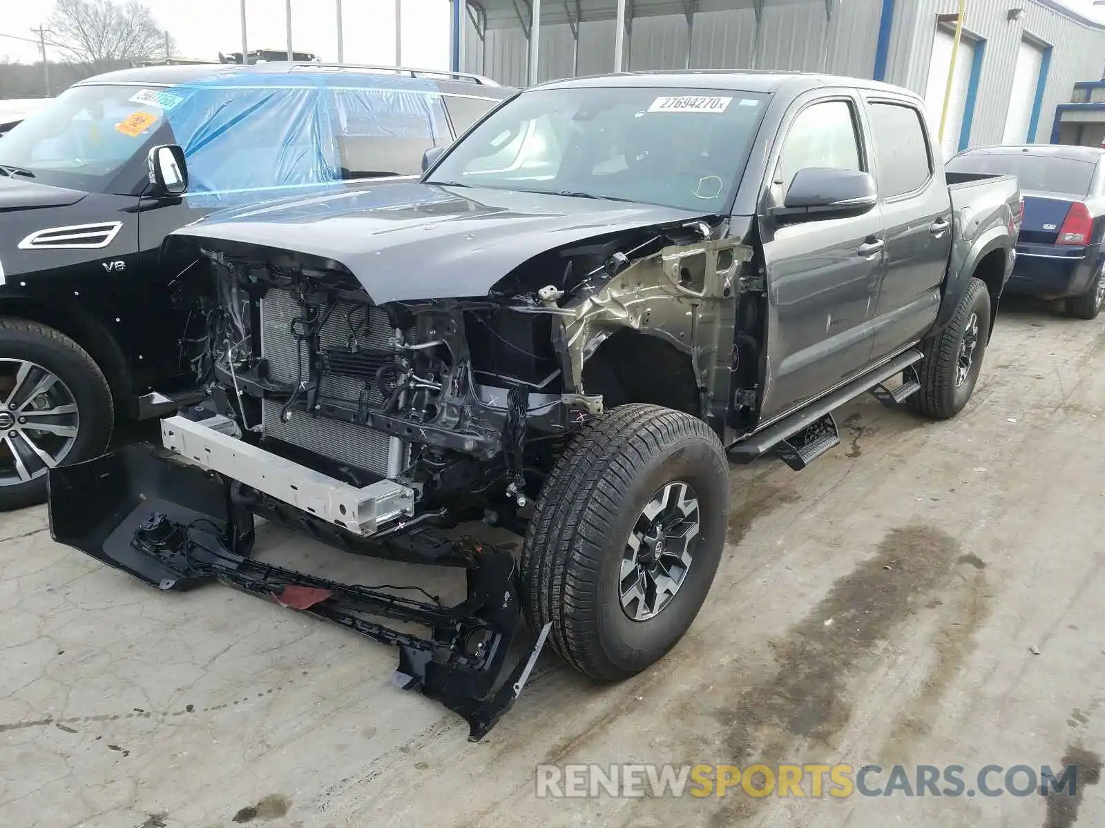 2 Photograph of a damaged car 3TMCZ5AN6KM227333 TOYOTA TACOMA 2019