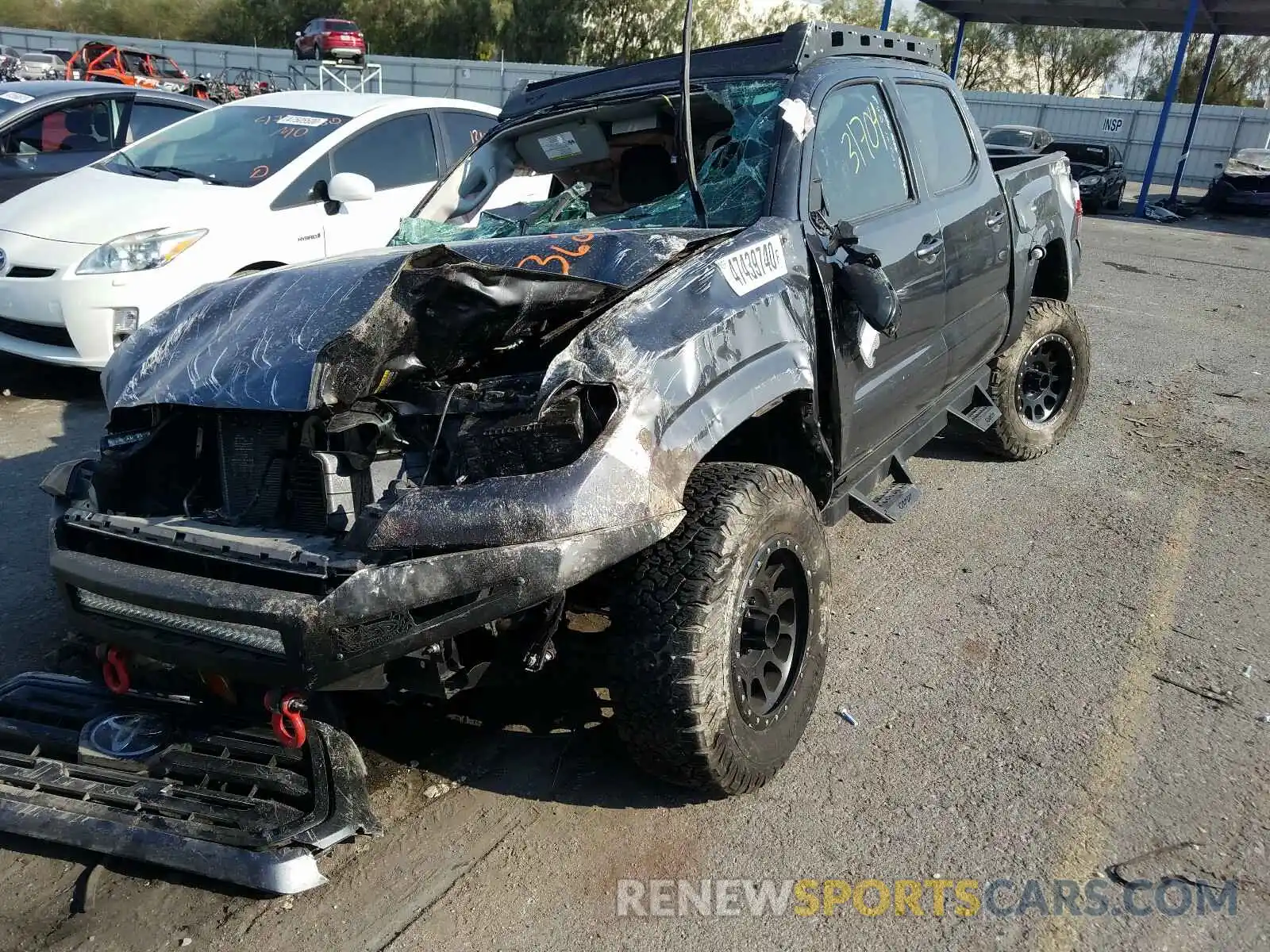 2 Photograph of a damaged car 3TMCZ5AN6KM228319 TOYOTA TACOMA 2019