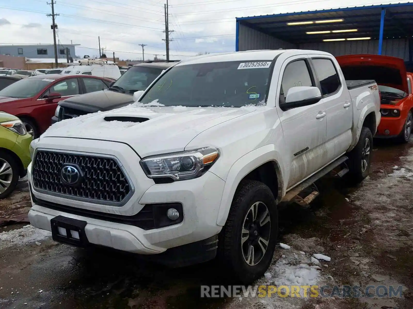 2 Photograph of a damaged car 3TMCZ5AN6KM228868 TOYOTA TACOMA 2019