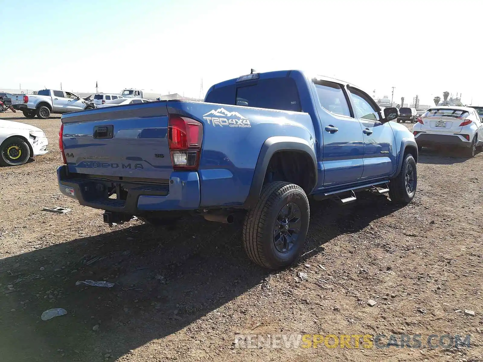 4 Photograph of a damaged car 3TMCZ5AN6KM230149 TOYOTA TACOMA 2019