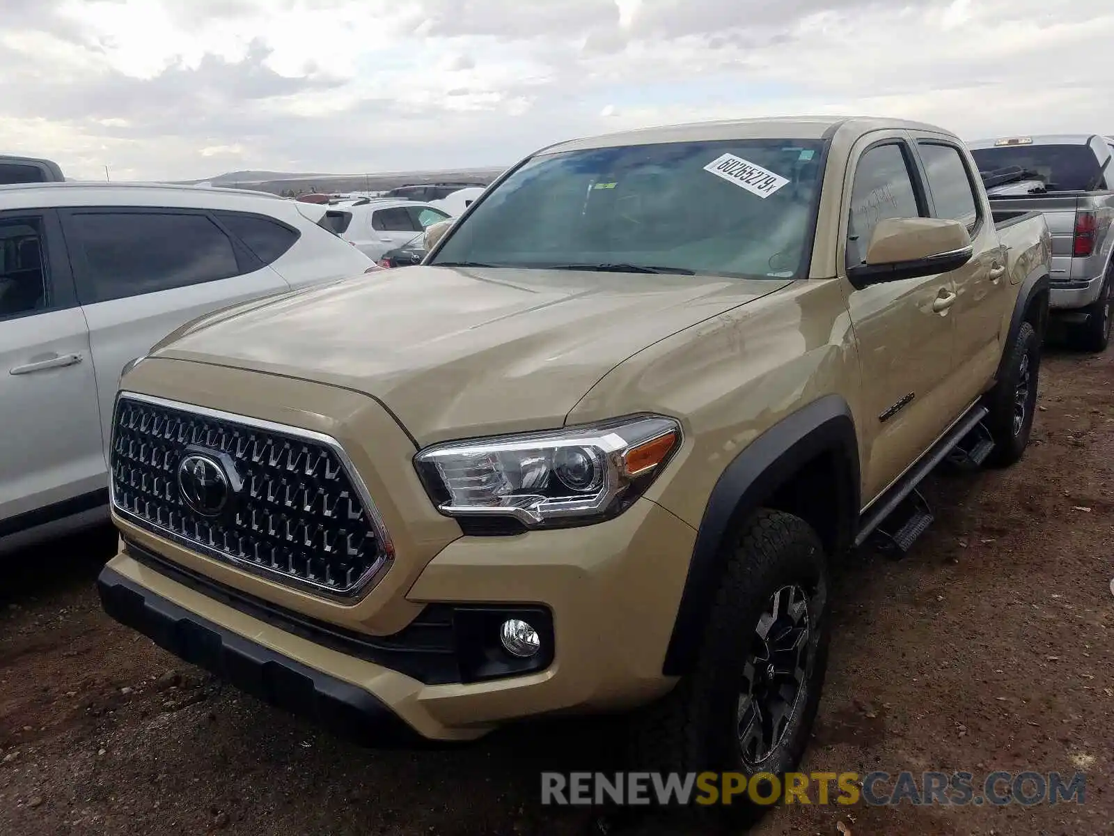 2 Photograph of a damaged car 3TMCZ5AN6KM230345 TOYOTA TACOMA 2019