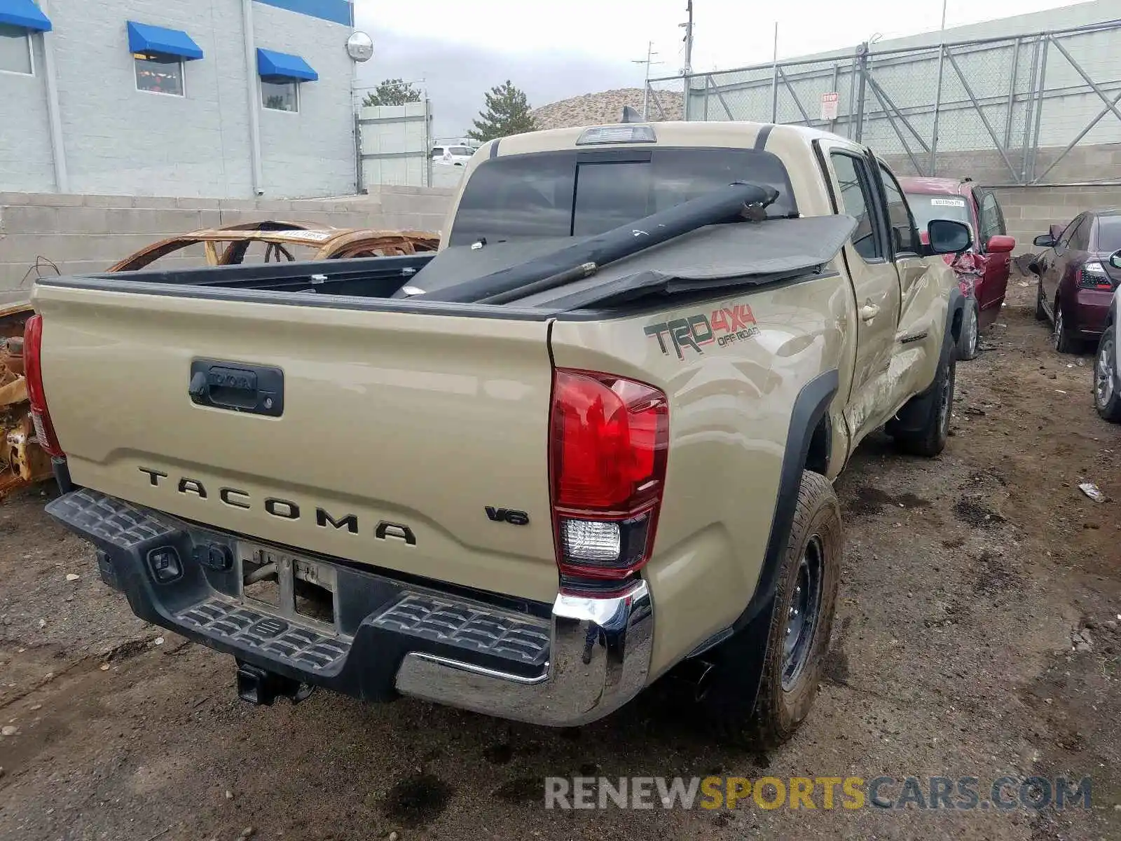 4 Photograph of a damaged car 3TMCZ5AN6KM230345 TOYOTA TACOMA 2019