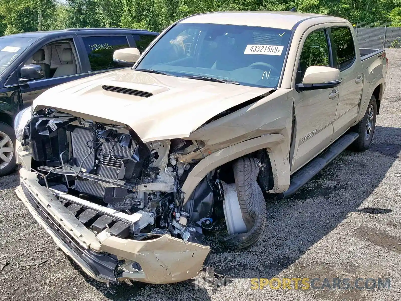 2 Photograph of a damaged car 3TMCZ5AN6KM230961 TOYOTA TACOMA 2019