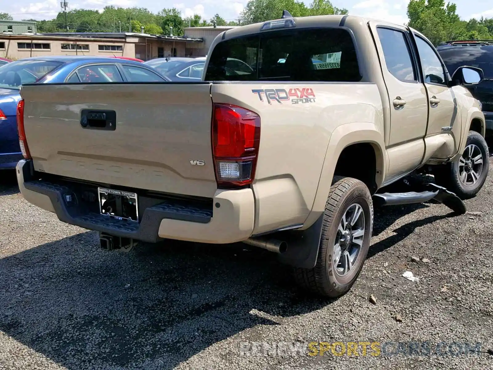 4 Photograph of a damaged car 3TMCZ5AN6KM230961 TOYOTA TACOMA 2019