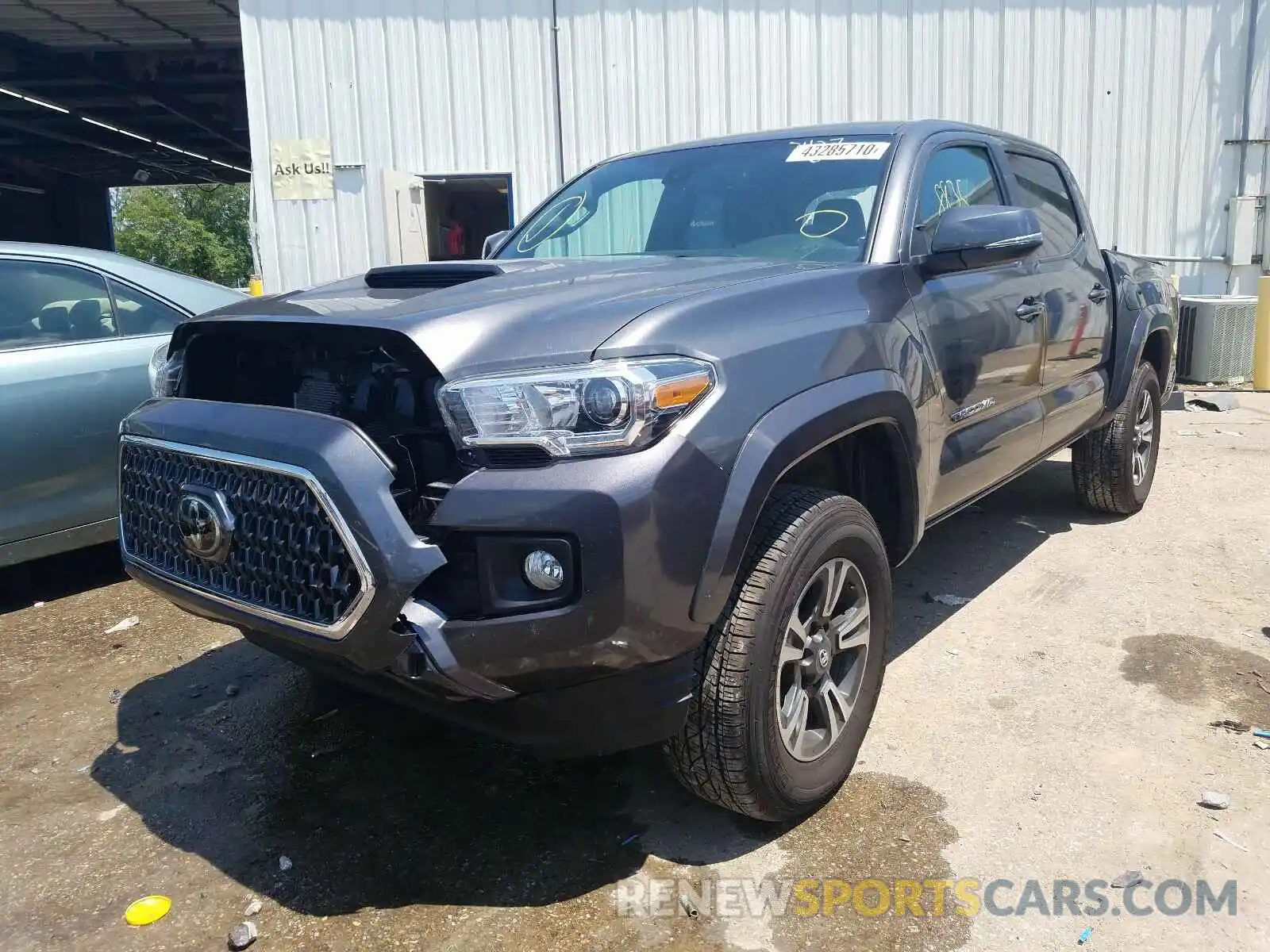 2 Photograph of a damaged car 3TMCZ5AN6KM231480 TOYOTA TACOMA 2019