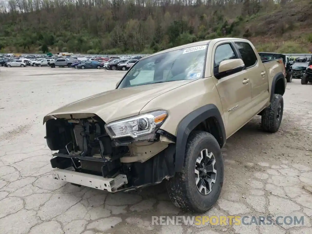 2 Photograph of a damaged car 3TMCZ5AN6KM232273 TOYOTA TACOMA 2019