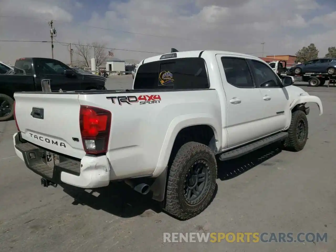 4 Photograph of a damaged car 3TMCZ5AN6KM232497 TOYOTA TACOMA 2019