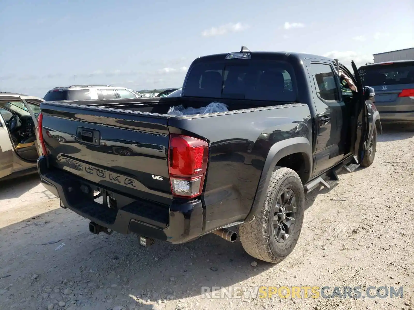 4 Photograph of a damaged car 3TMCZ5AN6KM234721 TOYOTA TACOMA 2019