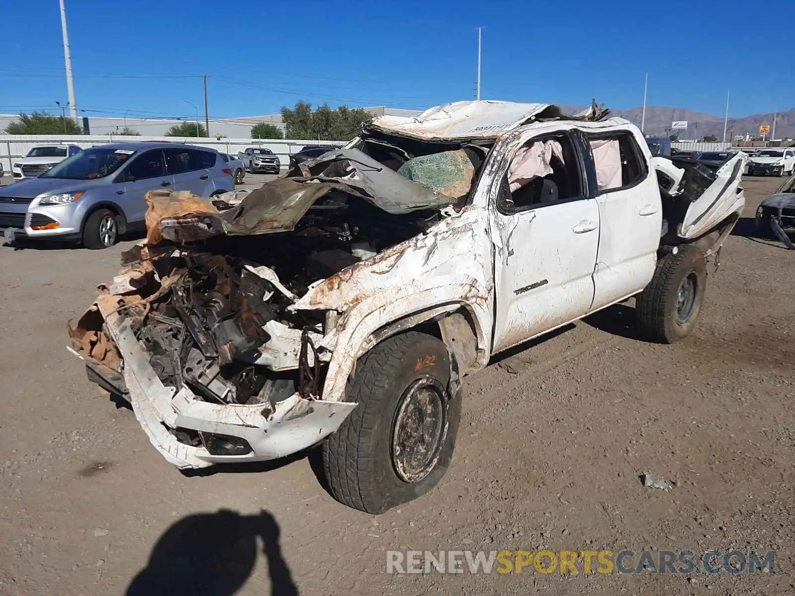 2 Photograph of a damaged car 3TMCZ5AN6KM235075 TOYOTA TACOMA 2019