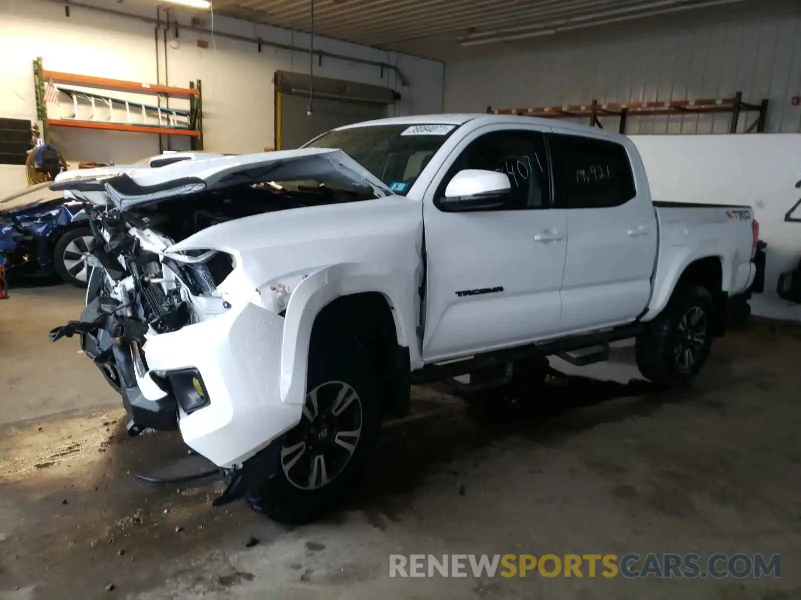 2 Photograph of a damaged car 3TMCZ5AN6KM238042 TOYOTA TACOMA 2019