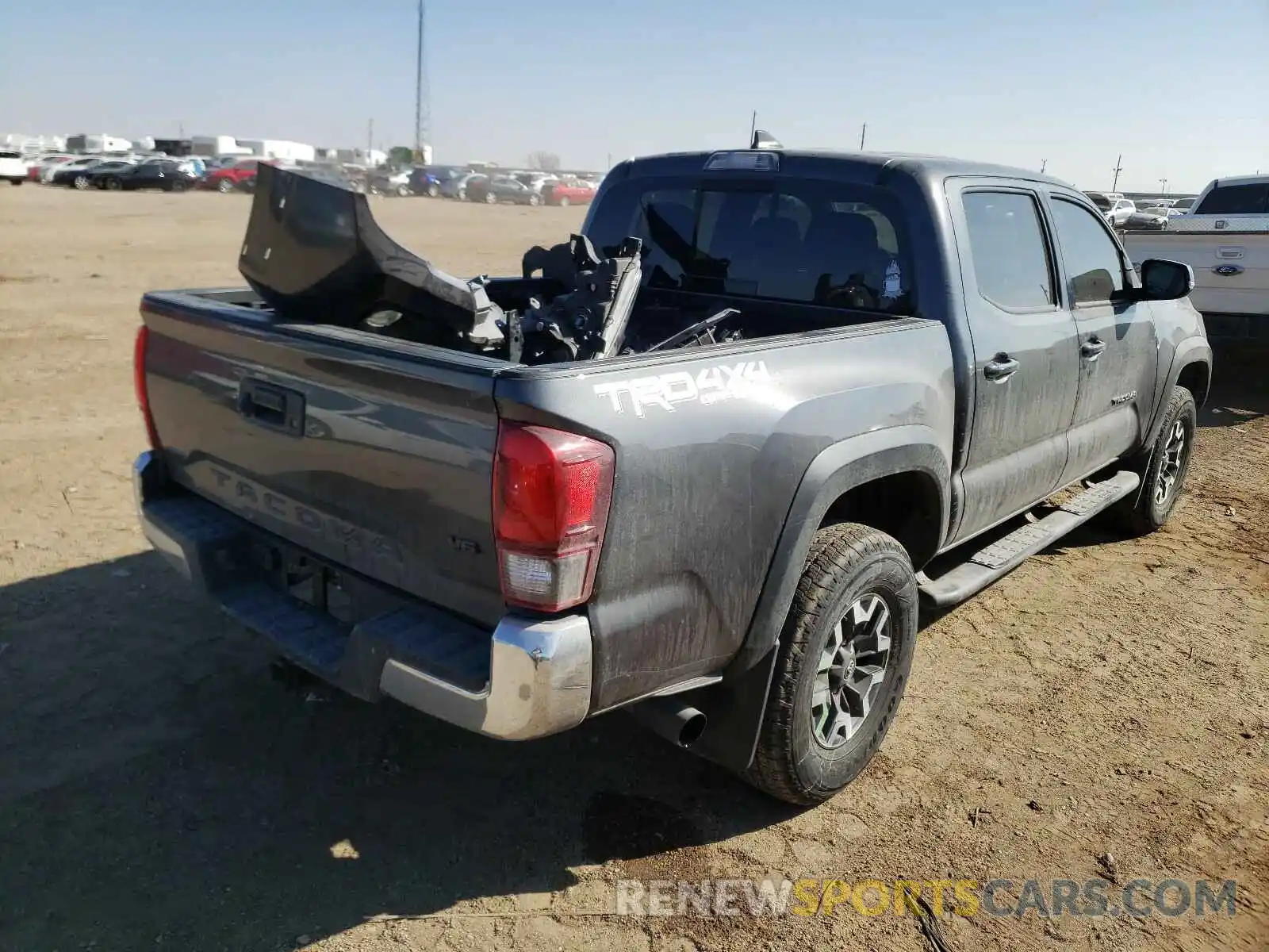 4 Photograph of a damaged car 3TMCZ5AN6KM238932 TOYOTA TACOMA 2019