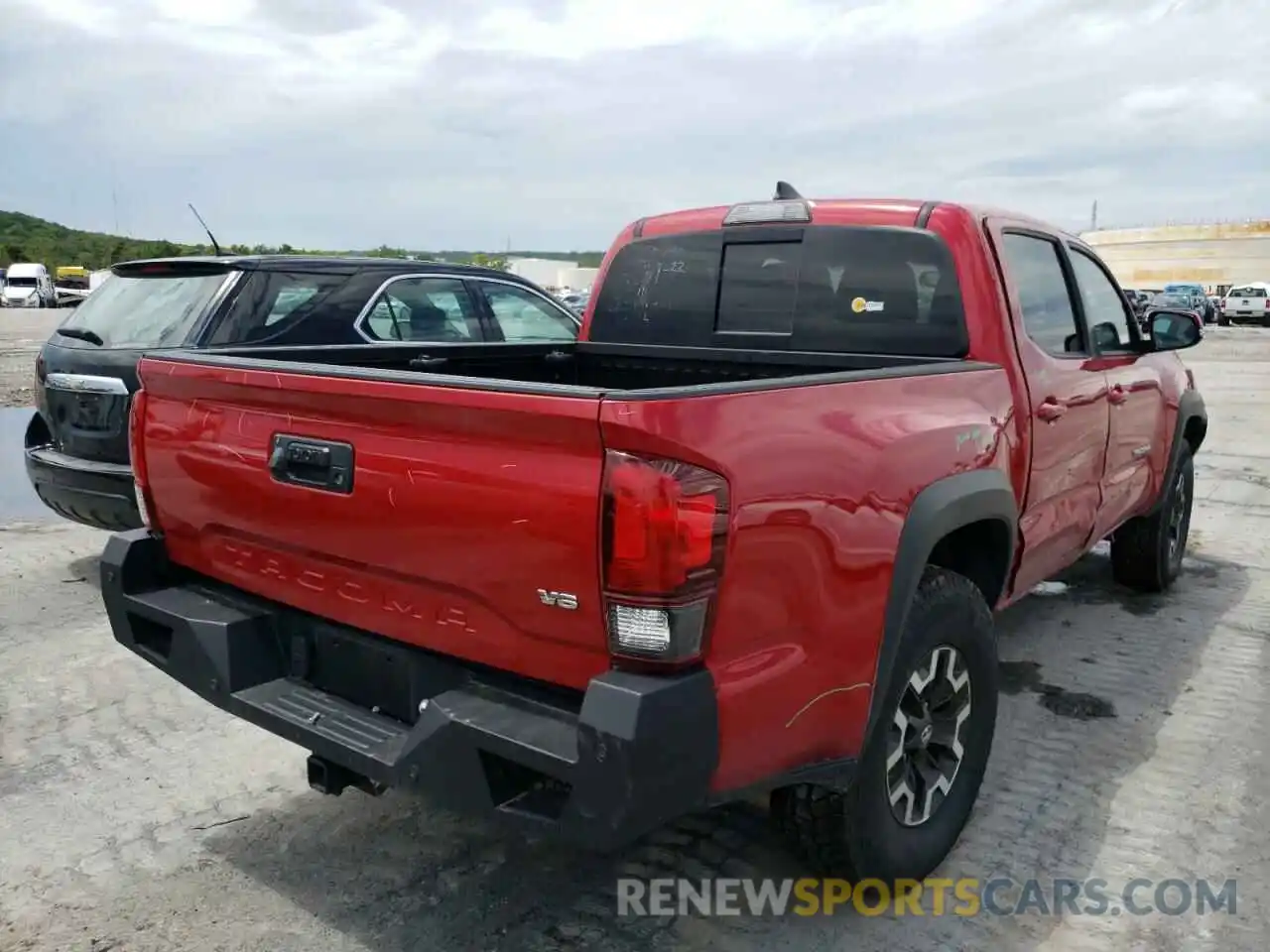 4 Photograph of a damaged car 3TMCZ5AN6KM239272 TOYOTA TACOMA 2019